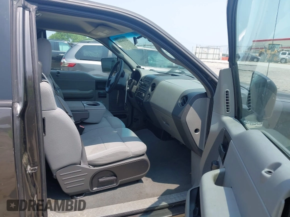 2005 Ford F-150 STX with VIN 1FTRX12W45NB95184, listed as a IAAI auction lot 42406068 with 164,727 mi miles and . Bid and sale history available at DreamBid. Image 5.