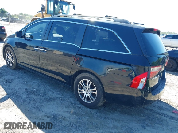 2011 Honda Odyssey EX-L with VIN 5FNRL5H67BB087064, listed as a IAAI auction lot 42326427 with 177,795 mi miles and . Bid and sale history available at DreamBid. Image 3.