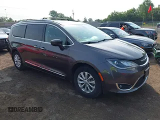2019 Chrysler Pacifica Touring L with VIN 2C4RC1BG2KR704756, listed as a IAAI auction lot 42464533 with 136,625 mi miles and . Bid and sale history available at DreamBid. Image 1.