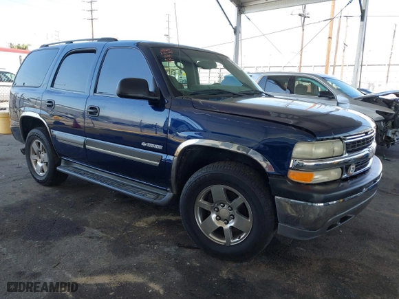 2003 Chevrolet Tahoe LT with VIN 1GNEC13T03J180708, listed as a IAAI auction lot 41543671 with 203,442 mi miles. Bid and sale history available at carsss.com. Image 1.