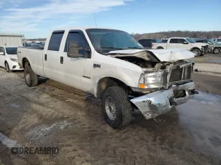 2000 Ford F-350 XL with VIN 1FTSW31F6YEC96409, listed as a Copart auction lot 42994345 with 334,310 mi miles and Salvage title. Bid and sale history available at DreamBid. Image 4.