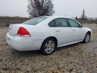 2016 Chevrolet Impala Limited LT with VIN 2G1WB5E35G1139066, listed as a IAAI auction lot 41093706 with 179,419 mi miles. Bid and sale history available at carsss.com. Image 4.