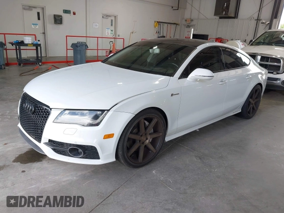2012 Audi A7 Prestige with VIN WAU3GAFC9CN073453, listed as a IAAI auction lot 42698833 with 82,643 mi miles and . Bid and sale history available at DreamBid. Image 2.