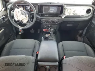 2024 Jeep Wrangler Sport S with VIN 1C4PJXDG3RW229567, listed as a Copart auction lot 55307335 with 7,797 mi miles and Salvage Title. Bid and sale history available at DreamBid. Image 8.