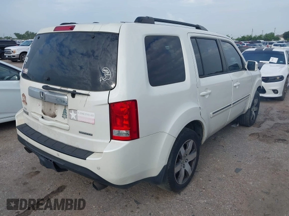 2013 Honda Pilot Touring with VIN 5FNYF3H95DB031130, listed as a IAAI auction lot 42669792 with 255,280 mi miles and . Bid and sale history available at DreamBid. Image 4.