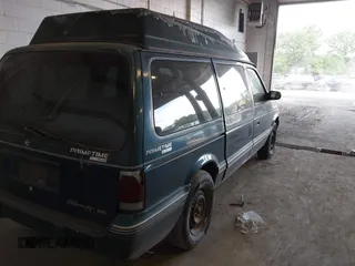 1995 Dodge Caravan Grand SE with VIN 1B4GH44R3SX566801, listed as a IAAI auction lot 42699597 with 103,069 mi miles and . Bid and sale history available at DreamBid. Image 6.