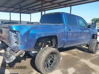 2017 GMC Sierra 1500 SLE with VIN 3GTU2MEC8HG345855, listed as a IAAI auction lot 42004600 with 104,767 mi miles and . Bid and sale history available at DreamBid. Image 4.