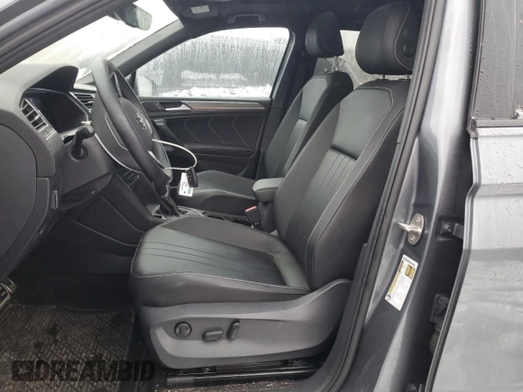 2023 Volkswagen Tiguan SE R-Line Black with VIN 3VV8B7AX2PM108307, listed as a Copart auction lot 43910665 with 21,448 mi miles and Salvage Title. Bid and sale history available at DreamBid. Image 7.