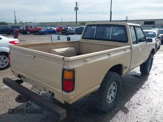 1984 Datsun 720 z VIN JN6ND06Y4EW011429, wystawiony jako IAAI lot #42358221 z przebiegiem 148 916 mil mil oraz . Historia ofert i sprzedaży dostępna na DreamBid. Obrazek 4.