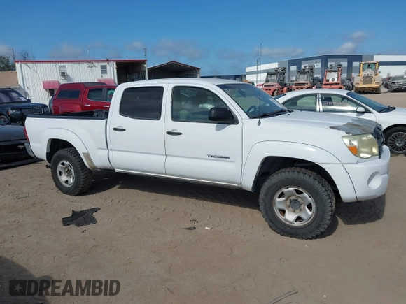 2005 Toyota Tacoma PreRunner with VIN 3TMKU72N65M001821, listed as a IAAI auction lot 41579911 with 301,297 mi miles. Bid and sale history available at carsss.com. Image 12.