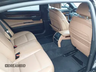 2014 BMW 7 Series 740Li with VIN WBAYE4C51ED138744, listed as a IAAI auction lot 42254213 with 116,157 mi miles and . Bid and sale history available at DreamBid. Image 8.