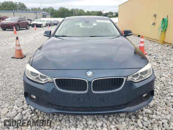 2015 BMW 4 Series 428i xDrive with VIN WBA4C9C57FD330687, listed as a Copart auction lot 67639034 with 114,779 mi miles and Salvage title. Bid and sale history available at DreamBid. Image 5.
