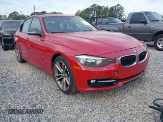 2012 BMW 3 Series 328i with VIN WBA3A5C55CF348003, listed as a IAAI auction lot 42034401 with 207,550 mi miles. Bid and sale history available at carsss.com. Image 1.
