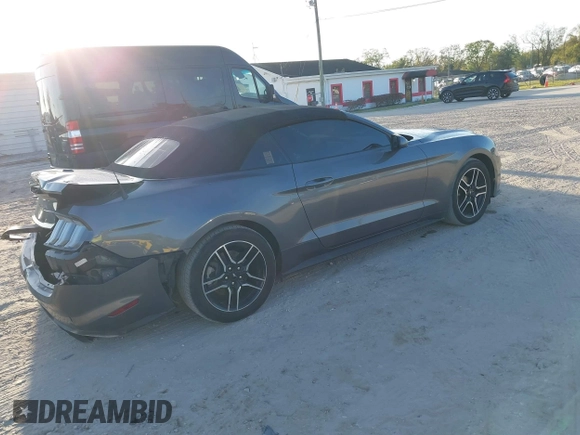 2021 Ford Mustang EcoBoost with VIN 1FATP8UH5M5107597, listed as a IAAI auction lot 41690617 with 54,164 mi miles. Bid and sale history available at carsss.com. Image 4.
