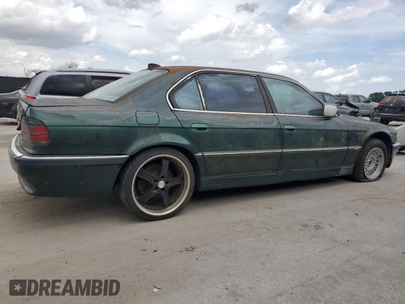 1996 BMW 7 Series 740iL z VIN WBAGJ8326TDL35670, wystawiony jako Copart lot #60806225 z przebiegiem 123 458 mil mil oraz Czysty tytuł • Clean title. Historia ofert i sprzedaży dostępna na DreamBid. Obrazek 3.