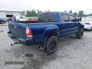 2015 Toyota Tacoma with VIN 3TMLU4EN1FM186747, listed as a IAAI auction lot 42493658 with 104,100 mi miles and . Bid and sale history available at DreamBid. Image 4.