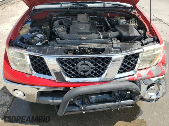 2006 Nissan Frontier LE with VIN 1N6AD07W76C460568, listed as a Copart auction lot 62859015 with 145,127 mi miles and Salvage title. Bid and sale history available at DreamBid. Image 11.