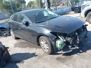 2014 Mazda Mazda3 i Touring with VIN JM1BM1L76E1186883, listed as a IAAI auction lot 41631169 with 104,305 mi miles. Bid and sale history available at carsss.com. Image 1.