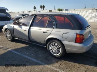 1997 Saturn SW z VIN 1G8ZK8279VZ169005, wystawiony jako Copart lot #73049694 z przebiegiem 110 215 mil mil oraz Szkody całkowita. Historia ofert i sprzedaży dostępna na DreamBid. Obrazek 2.