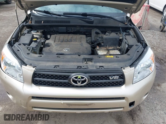 2006 Toyota RAV4 with VIN JTMZK33V365000984, listed as a IAAI auction lot 41957813 with 121,527 mi miles. Bid and sale history available at carsss.com. Image 10.