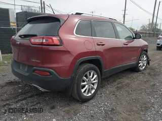 2015 Jeep Cherokee Limited with VIN 1C4PJMDSXFW604627, listed as a IAAI auction lot 42072953 with 102,501 mi miles and . Bid and sale history available at DreamBid. Image 4.