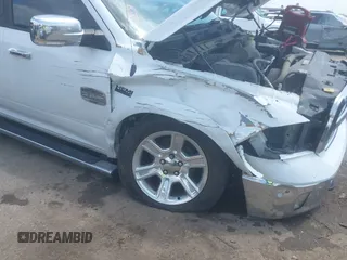 2014 Ram 1500 with VIN 1C6RR6WT1ES454858, listed as a IAAI auction lot 42128460 with 163,965 mi miles and . Bid and sale history available at DreamBid. Image 6.