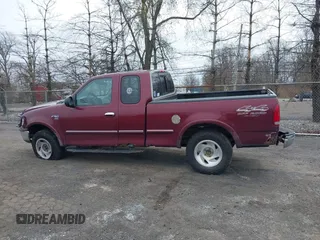 1998 Ford F-150 XL with VIN 1FTDX18W9WKA01690, listed as a IAAI auction lot 41944734 with 176,359 mi miles. Bid and sale history available at carsss.com. Image 14.
