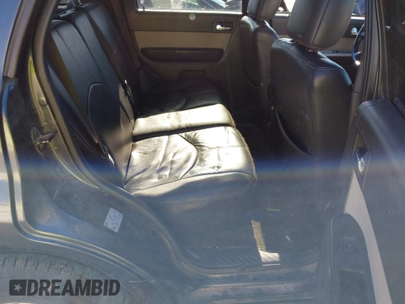 2010 Mercury Mariner Premier with VIN 4M2CN9HG6AKJ17408, listed as a IAAI auction lot 42374385 with 190,488 mi miles and . Bid and sale history available at DreamBid. Image 8.