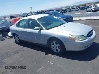 2003 Ford Taurus SE Standard with VIN 1FAFP53UX3G268265, listed as a IAAI auction lot 42090151 with 139,734 mi miles. Bid and sale history available at carsss.com. Image 1.