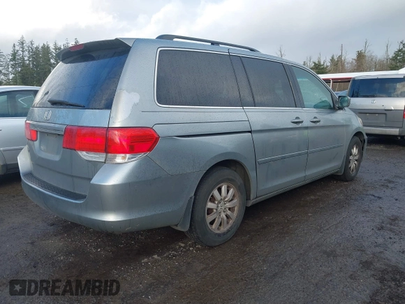 2010 Honda Odyssey EX-L with VIN 5FNRL3H70AB027137, listed as a IAAI auction lot 41659981 with 202,256 mi miles and . Bid and sale history available at DreamBid. Image 4.
