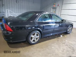 2002 Lincoln LS w/Base Pkg with VIN 1LNHM87A52Y714212, listed as a Copart auction lot 84810774 with 68,413 mi miles and Salvage Title. Bid and sale history available at DreamBid. Image 3.