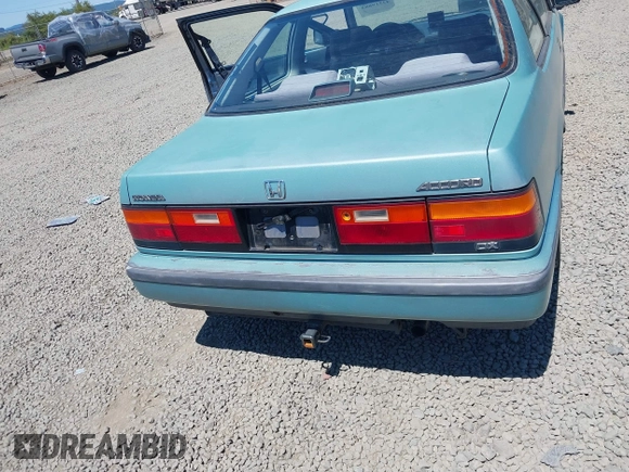 1988 Honda Accord z VIN 1HGCA6268JA052214, wystawiony jako IAAI lot #42519883 z przebiegiem 270 026 mil mil oraz . Historia ofert i sprzedaży dostępna na DreamBid. Obrazek 6.