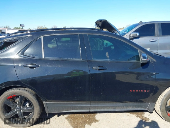 2023 Chevrolet Equinox Premier z VIN 3GNAXNEG8PL240694, wystawiony jako IAAI lot #41212275 z przebiegiem 28 134 mil mil oraz . Historia ofert i sprzedaży dostępna na DreamBid. Obrazek 13.