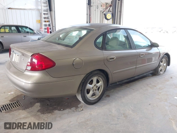 2002 Ford Taurus SES Standard with VIN 1FAFP55U32A171004, listed as a IAAI auction lot 41782261 with 105,967 mi miles. Bid and sale history available at carsss.com. Image 4.