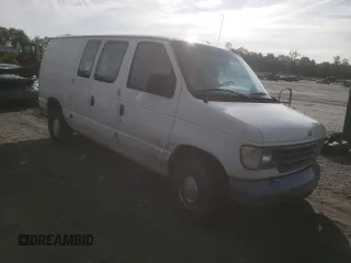 1992 Ford Econoline Cargo with VIN 1FTEE14Y2NHB57650, listed as a Copart auction lot 60258605 with 313,337 mi miles and Salvage title. Bid and sale history available at DreamBid. Image 4.
