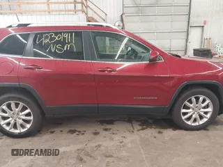 2016 Jeep Cherokee Limited with VIN 1C4PJMDB0GW337600, listed as a IAAI auction lot 42301911 with 163,441 mi miles and . Bid and sale history available at DreamBid. Image 14.