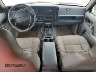 1996 Jeep Cherokee Sport z VIN 1J4FJ68S3TL103684, wystawiony jako Copart lot #63466265 z przebiegiem 163 715 mil mil oraz Czysty tytuł • Clean title. Historia ofert i sprzedaży dostępna na DreamBid. Obrazek 8.