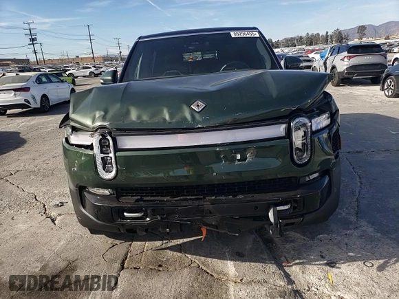 2024 Rivian R1S Adventure z VIN 7PDSGABA6RN033514, wystawiony jako Copart lot #89296455 z przebiegiem Nie podano mil oraz Szkody całkowita. Historia ofert i sprzedaży dostępna na DreamBid. Obrazek 11.