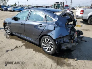 2016 Honda Civic EX with VIN 19XFC2F70GE214585, listed as a Copart auction lot 55607165 with 148,528 mi miles and Salvage Title. Bid and sale history available at DreamBid. Image 2.