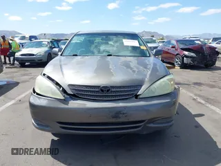 2004 Toyota Camry LE with VIN 4T1BE32K44U825561, listed as a IAAI auction lot 42051914 with 244,521 mi miles and . Bid and sale history available at DreamBid. Image 11.