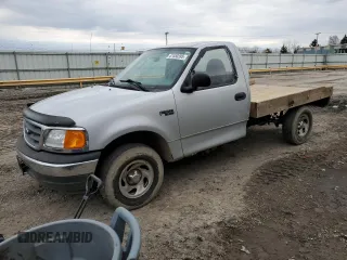 2004 Ford F-150 XL with VIN 2FTRF18274CA75519, listed as a Copart auction lot 47450395 with 129,099 mi miles and Salvage title. Bid and sale history available at DreamBid. Image 1.