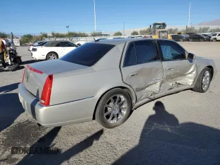2007 Cadillac DTS Performance z VIN 1G6KD57907U187194, wystawiony jako Copart lot #79310374 z przebiegiem 108 144 mil mil oraz Szkoda całkowita • Salvage title. Historia ofert i sprzedaży dostępna na DreamBid. Obrazek 3.