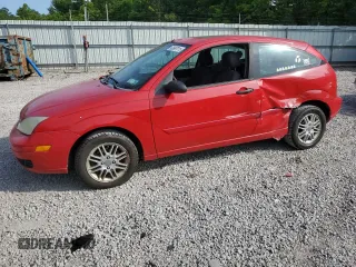 2006 Ford Focus S with VIN 1FAFP31N46W174702, listed as a Copart auction lot 60667015 with 166,203 mi miles and Salvage title. Bid and sale history available at DreamBid. Image 1.