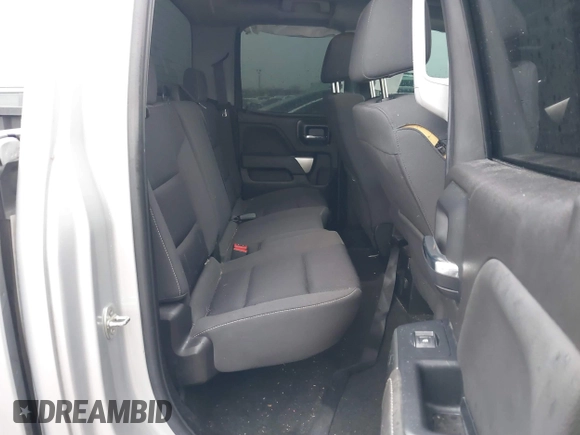 2018 Chevrolet Silverado 1500 LT with VIN 1GCRCREC4JZ287085, listed as a IAAI auction lot 41450057 with 79,275 mi miles and . Bid and sale history available at DreamBid. Image 8.