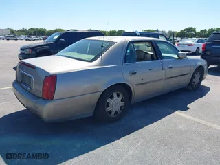 2004 Cadillac DeVille with VIN 1G6KD54Y44U121318, listed as a IAAI auction lot 41833122 with 152,258 mi miles. Bid and sale history available at carsss.com. Image 4.