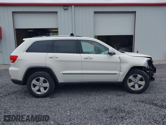 2011 Jeep Grand Cherokee Laredo with VIN 1J4RR4GG6BC680943, listed as a IAAI auction lot 42419575 with 188,672 mi miles and . Bid and sale history available at DreamBid. Image 13.