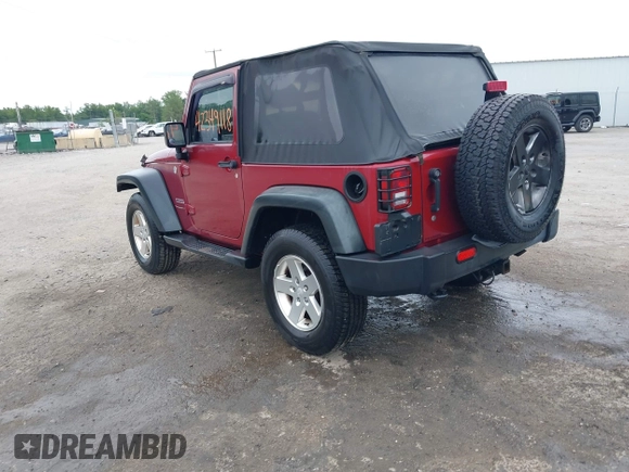 2012 Jeep Wrangler Sport with VIN 1C4AJWAG3CL197295, listed as a IAAI auction lot 42349118 with 117,381 mi miles and . Bid and sale history available at DreamBid. Image 3.