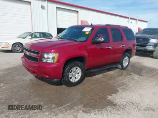 2007 Chevrolet Tahoe LT with VIN 1GNFC13J47R215812, listed as a IAAI auction lot 41794601 with 229,970 mi miles and . Bid and sale history available at DreamBid. Image 2.