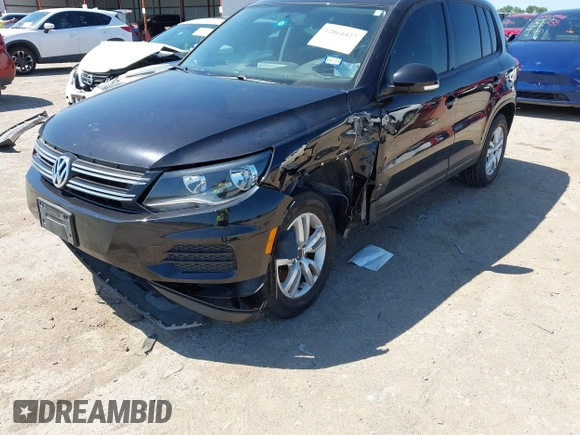2015 Volkswagen Tiguan SE with VIN WVGAV7AX1FW558855, listed as a IAAI auction lot 42064427 with 58,584 mi miles and . Bid and sale history available at DreamBid. Image 6.