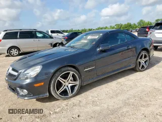 2011 Mercedes-Benz SL 550 z VIN WDBSK7BA8BF164435, wystawiony jako Copart lot #61465885 z przebiegiem 67 462 mil mil oraz Szkoda całkowita • Salvage title. Historia ofert i sprzedaży dostępna na DreamBid. Obrazek 1.